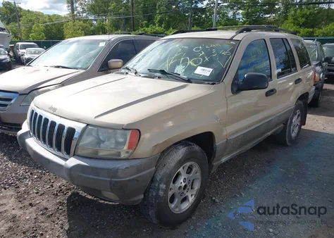 2000 Jeep Grand Cherokee Laredo из США, поврежденный, VIN 1J4GW48S3YC347711
